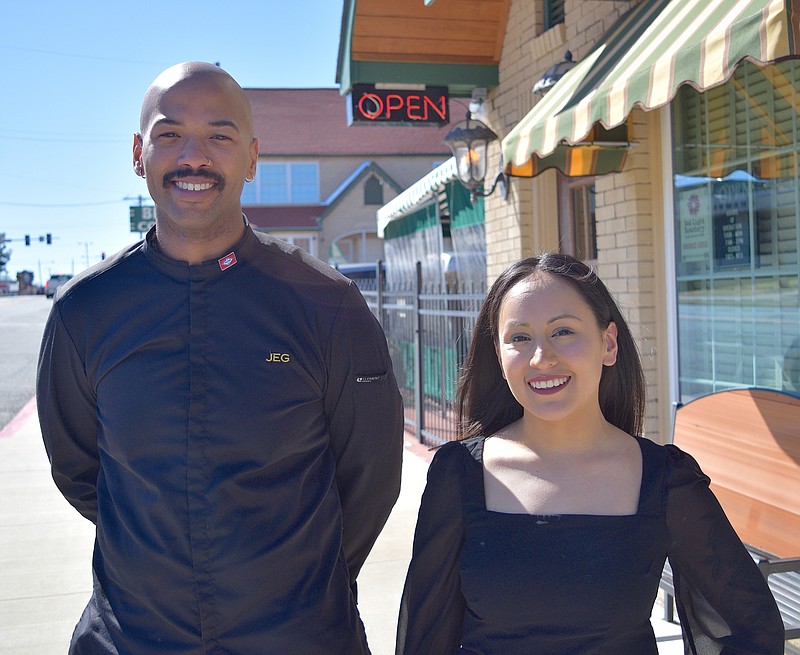 Joshua Garland, owner of Best Cafe and DONS Southern Social, and Fatima Alvirde, the director of operations for both restaurants, are shown outside Best Cafe. - Photo by Donald Cross of The Sentinel-Record