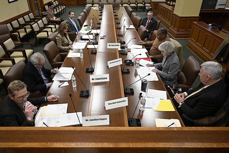 Members of the Independent Citizens Committee meet at the State Capitol to discuss salary adjustments for elected officials on Friday, Feb. 17. The committee decided not to approve any salary increases and to revisit the proposal in May. (Arkansas Democrat-Gazette/Stephen Swofford)