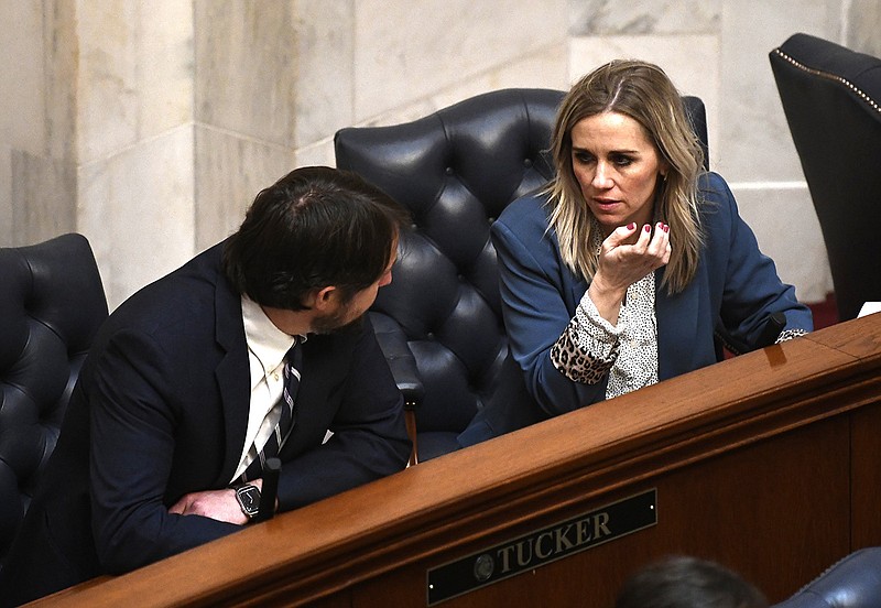 Senator Clarke Tucker, D-Little Rock, talks with Senator Breanne Davis, R-Russellville, during a meeting of the Senate at the Arkansas State Capitol on Monday, Feb. 20, 2023.

(Arkansas Democrat-Gazette/Stephen Swofford)