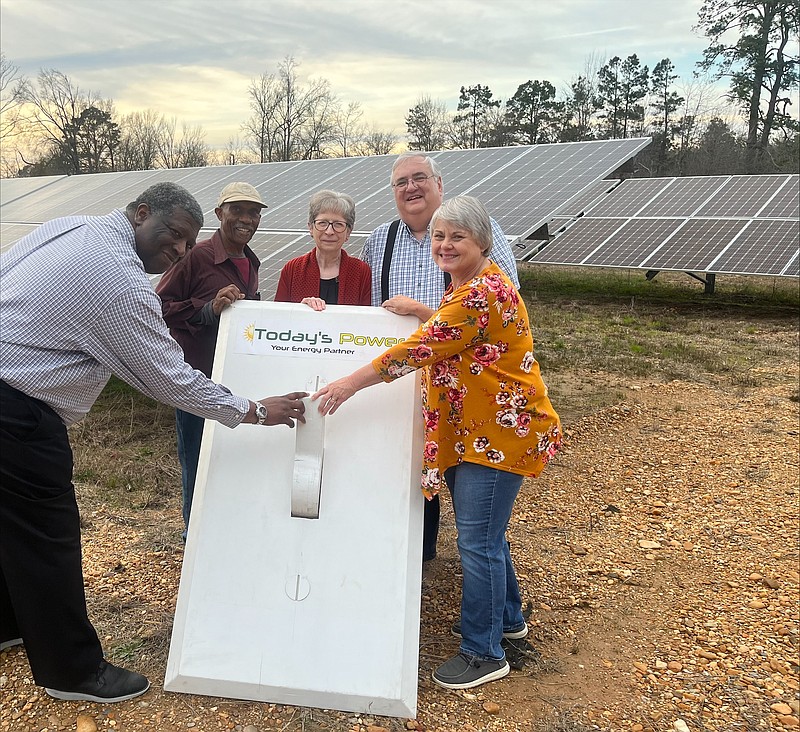 Photo by Today's Power
Mayor Stephens Harry Brown and Mayor of Bearden Ginger Bailey flip the switch on one of two solar arrays in Bearden built by Today's Power, Inc..