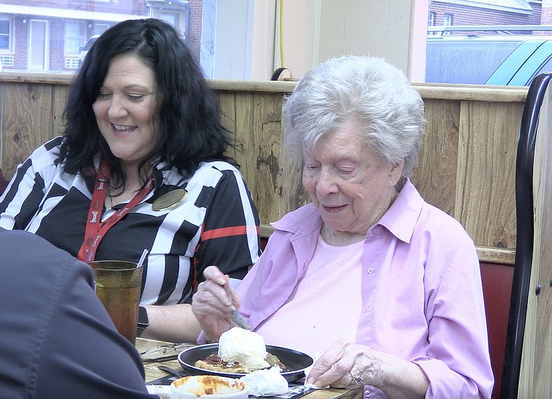 Mary Ragsdale, right, enjoys some pie and ice cream from McClard's Bar-B-Q on her birthday. – Photo by Courtney Edwards of The Sentinel-Record