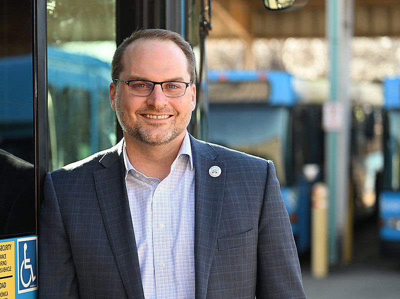 Justin Avery, CEO of Rock Region METRO, poses for a photo Thursday, Feb. 9, 2023 on a bus at Rock Region headquarters in North Little Rock.
(Arkansas Democrat-Gazette/Staci Vandagriff)