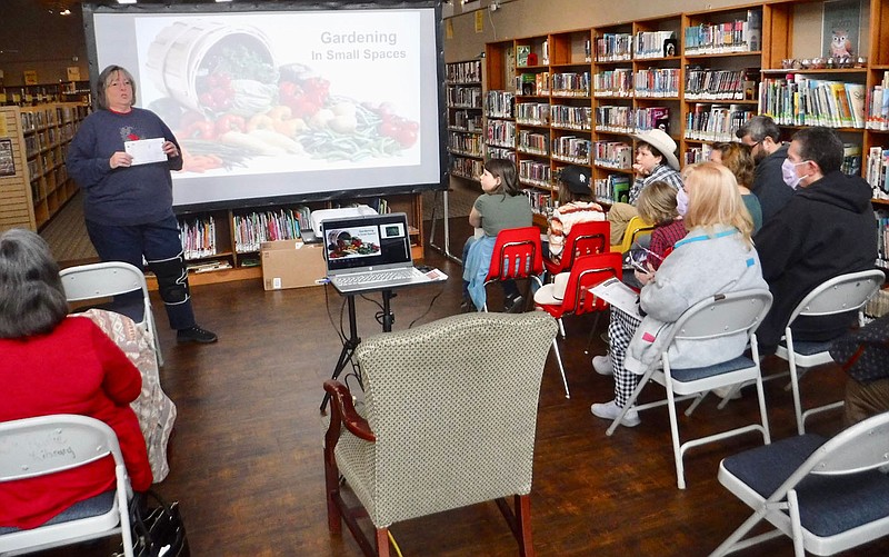 Susan Holland/Westside Eagle Observer Karen Benson, director of the Gravette Public Library, speaks at a Gardening in Small Spaces class at the library Saturday, Feb. 25. Participants were given a kit with gardening tips and a free grow bag. The library will host a seed exchange Saturday, March 4, from 10 a.m. to 1 p.m., as a part of its Grow It — Cook It — Save It program, and a class on microgreens will be held Saturday, March 18, at 11 a.m. Call the library at 479-787-6955 if interested.