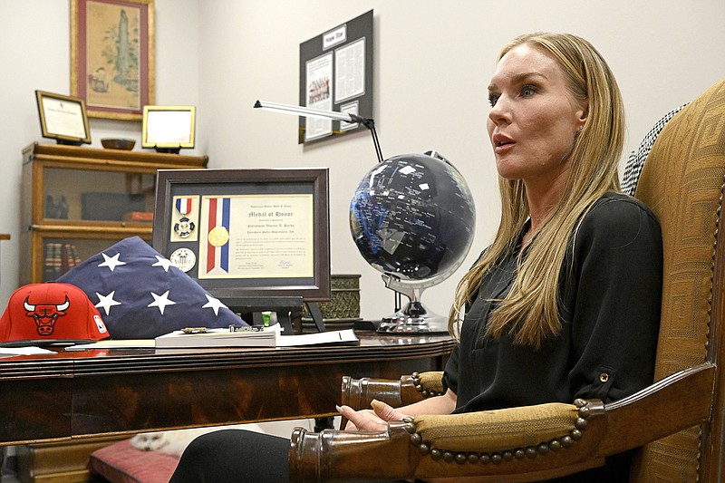 Christina Parks, the widow of Vincent Parks, talks with a reporter at her lawyer's office on Thursday, Feb. 23, 2023. Vincent Parks, a Jonesboro Police recruit, died on his first day at the Arkansas Law Enforcement Training Academy in July, 2022.
(Arkansas Democrat-Gazette/Stephen Swofford)