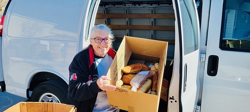 Shauna Devenport, a.k.a. the "Bread Lady," unloads her van at her Salt Lake City home in February. (Photo by Kate Nielsen)