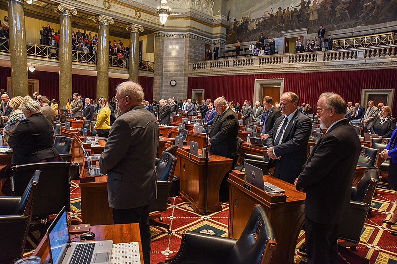 Julie Smith/News Tribune photo:
A moment of silence is recognized on the Missouri House Floor Tuesday, Feb. 28, 2023, following a reading by Rep. Willard Haley, R-Eldon, who spoke about the life and accomplishments of James L. Shipley, who passed away July 22, 2022, at age 99. Shipley, who lived in Tipton, was a Tuskegee Airman who worked on planes in World War II. Shipley was widely known and respected for his service to country and his lineman's work and love of his church community following his military career. Haley has sponsored House Bill 44 that reads "The portion of U.S. Highway 50 from Bahner Quarry Road continuing west to Tower Road through the City of Tipton in Moniteau County shall be designated the 'SGT James L Shipley Memorial Highway.' The (Missouri) Department of Transportation shall erect and maintain appropriate signs designating such highway, with the costs to be paid by private donations."