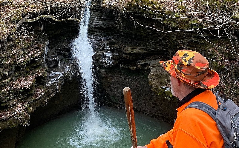 Glen Pagan admires Little Cow Falls during a day hike Feb. 4 in the Ozarks with the Takahik River Valley Hikers. (Special to the Democrat-Gazette/Bob Robinson)