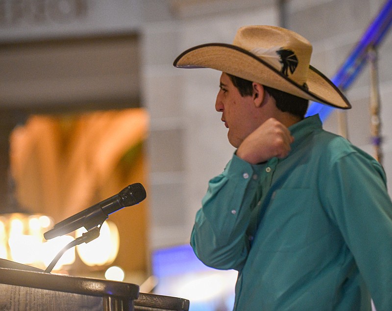 Julie Smith/News Tribune photo: 
Brent Deputy, Jr. works the crowd as he concludes his remarks Wednesday, March 1, 2023, in front of hundreds of advocates and self-advocates in the state Capitol Rotunda for Disability Rights Legislative Day in Jefferson City. Deputy, who is from Springfield, was the recipient of prolonged applause upon conclusion of his speech.