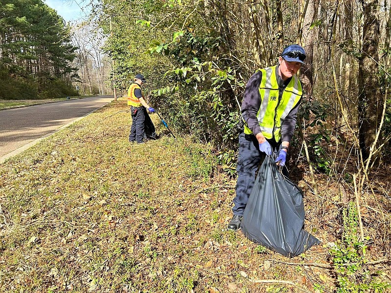 El Dorado firefighters participated in a community cleanup held Feb. 18 in preparation for the Governor's Conference on Tourism, which was held in El Dorado this week. Keep El Dorado Beautiful leaders hope to continue efforts to keep the city clean and litter-free as the year continues. (News-Times file)
