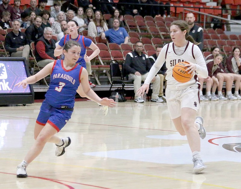 Mark Ross/Special to the Herald-Leader
Siloam Springs senior Brooke Smith (right) brings the ball up the floor as Paragould's Reese Roleson defends during Wednesday's opening round game at the Class 5A state tournament at Pine Bluff Convention Center. Siloam Springs defeated Paragould 40-39.