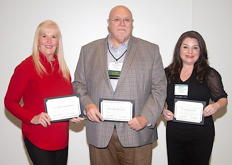 El Dorado City Council Member Dianne Hammond, left, Mayor Paul Choate and City Clerk Heather McVay receive certificates through the Arkansas Municipal League's voluntary certification program. The trio was honored along with other municipal officials and personnel around the state for their completion of the annual program during the 2023 AML Winter Conference. The conference was held in January in Little Rock. (Contributed)