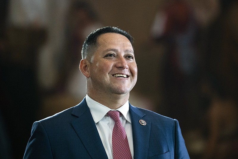 FILE - Rep. Tony Gonzales, R-Texas, is seen before the flag-draped casket bearing the remains of Hershel W. "Woody" Williams lies in honor in the U.S. Capitol, July 14, 2022, in Washington. Gonzales was censured Saturday, March 4, 2023, in a rare move by his state party over votes that included supporting new gun safety laws after the Uvalde school shooting in his district. (Tom Williams/Pool photo via AP, File)