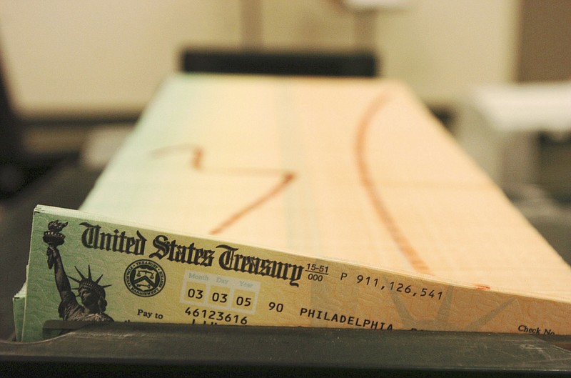 In this Feb. 11, 2005, file photo, trays of printed Social Security checks wait to be mailed from the U.S. Treasury's Financial Management services facility in Philadelphia. (AP file photo/Bradley C. Bower)