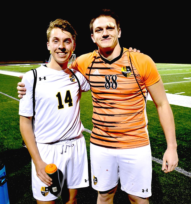 Mark Humphrey/Enterprise-Leader
Prairie Grove seniors, Davis Huitink (left) and Corbin Bowlin, are excited about the start of the spring boys soccer season. The Tigers began the season with a match against their rivals from Lincoln on Tuesday, Feb. 28.