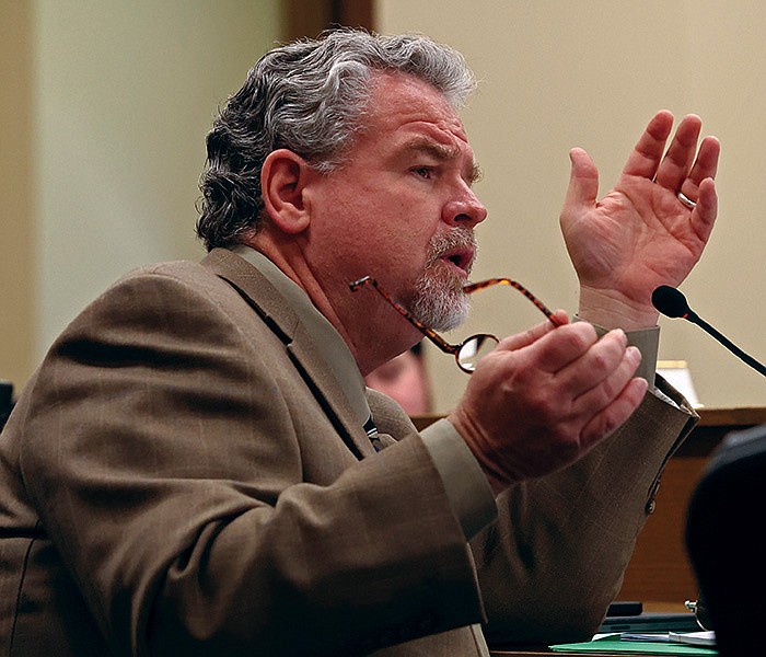 Sen. Alan Clark, R-Lonsdale, asks a question during a meeting of the Senate Committee on Judiciary about SB270 at the Arkansas state Capitol on Monday.

(Arkansas Democrat-Gazette/Colin Murphey)