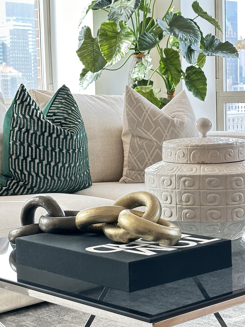 Greenery and other green accents help add a bright, vibrant pop of color. (Handout/TNS)