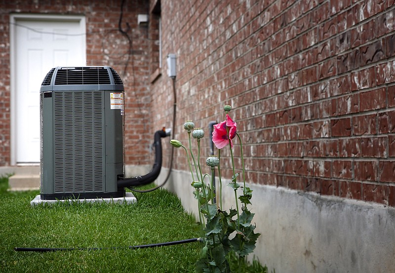 Don’t overlook your outdoor AC unit when preparing for warmer weather. The unit needs clear space around it to vent properly. (Dreamstime/TNS)
