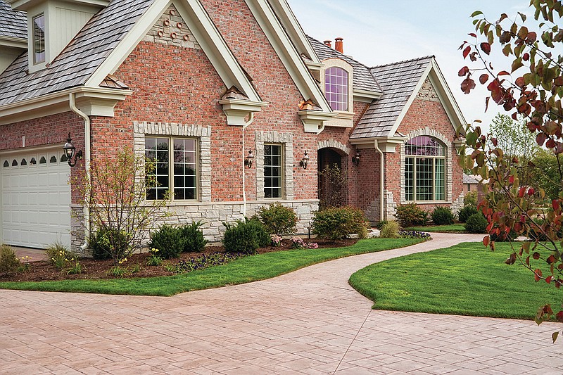 Upgrading a driveway and walkway is one way to update a home’s exterior and restore its curb appeal. - Submitted photo