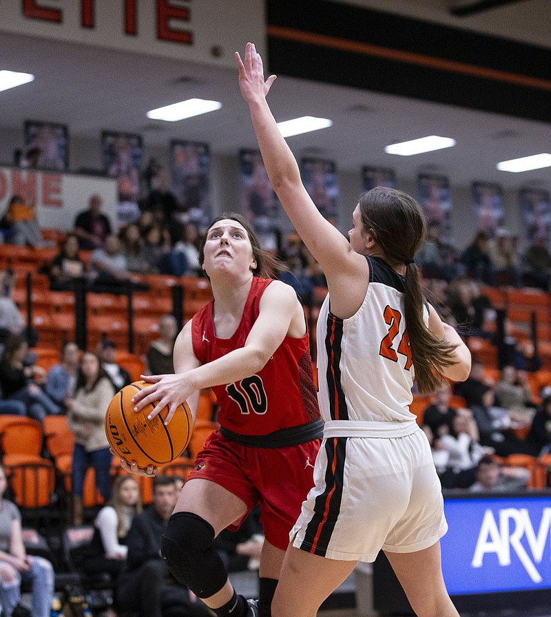 Reese Shirey (left) will be directing traffic at the point guard position for Farmington, which faces Nashville in the girls Class 4A state championship game today at noon at Bank OZK Arena in Hot Springs. The game is a rematch from last season when Nashville won 42-41 on a last-second 3-point basket. (Special to the NWA Democrat-Gazette/David Beach)