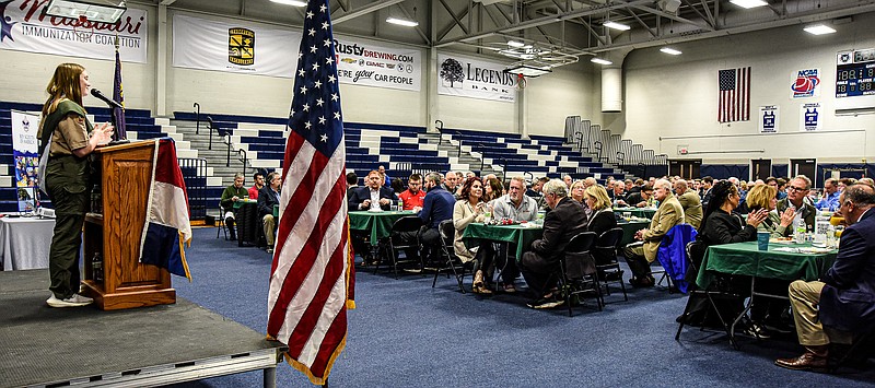 Julie Smith/News Tribune photo: 
Lydia Downing, a student at Blair Oaks High School and member of  Boy Scout Troop 10, talks about what becoming an Eagle Scout has meant to her. She said that since she could only join BSA a few years ago that she had to work hard to achieve that rank but appreciates that opportunity. Downing spoke Wednesday, March 8, 2023, at the Boy Scouts Patron Breakfast in Jason Gym.