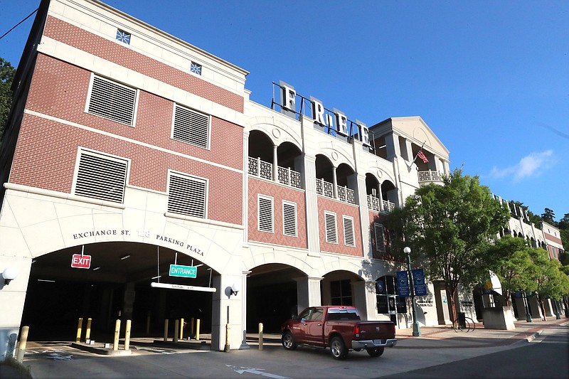 A motorist turns into the Exchange Street Parking Plaza in 2021 in this file photo. - File photo by The Sentinel-Record