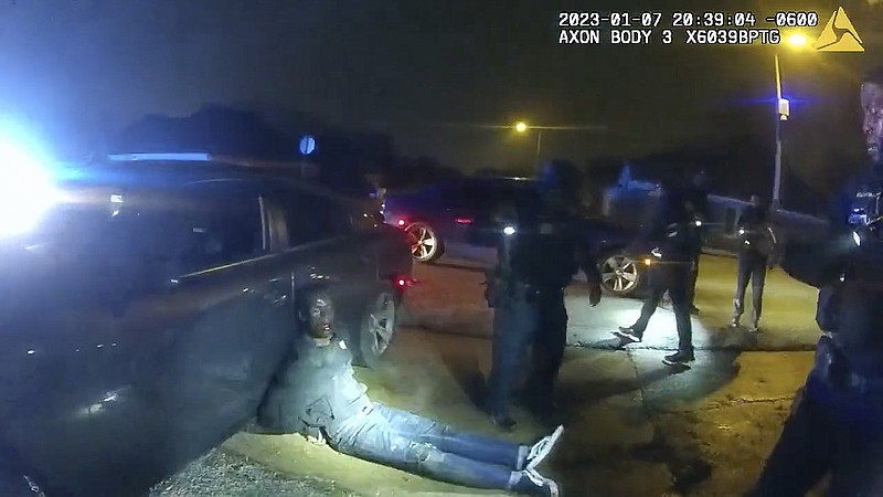 FILE - In this image from video released on Jan. 27, 2023, by the city of Memphis, Tenn., Tyre Nichols leans against a car after a brutal attack by five Memphis Police officers on Jan. 7, in Memphis. The Justice Department announced Wednesday, March 8, that it will review the Memphis Police Department policies on use of force, de-escalation policies and specialized units in response to the fatal beating of Tyre Nichols during an arrest. (City of Memphis via AP, File)