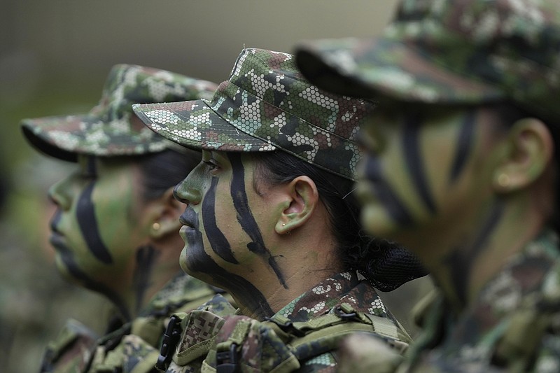 Female voluntary recruits attend a three-month training program March 6 at a military base in Bogota, Colombia. (AP/Fernando Vergara)