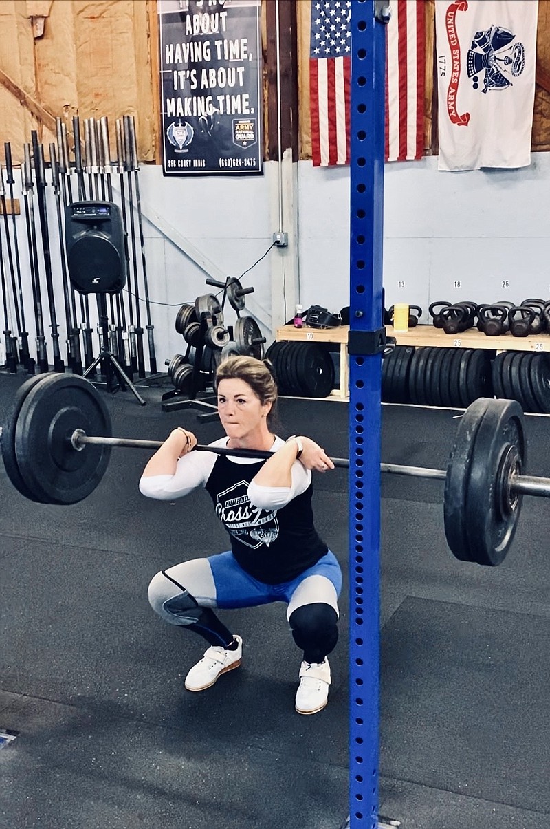 Maria Holee front squatting at Jefferson City CrossFit.
(Courtesy of Maria Holee)