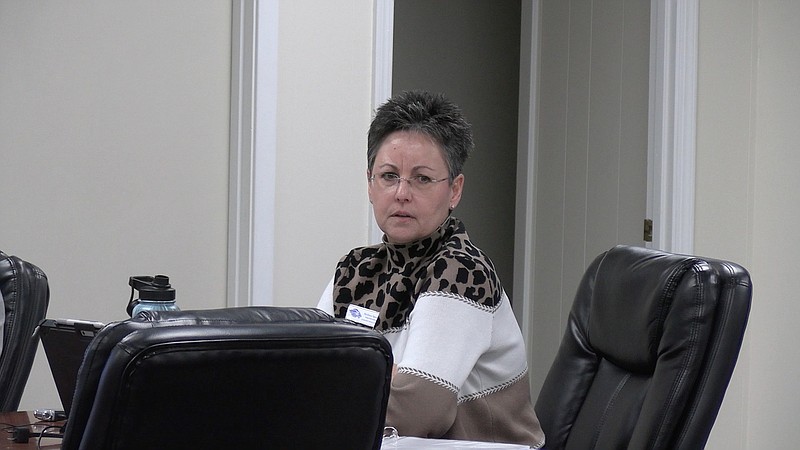 Jessieville Superintendent Melissa Speers sits in the Click building Friday. The Jessieville School Board met to vote and discuss the repair of the tornado destruction of its football and track facilities. - Photo by Lance Porter of The Sentinel-Record