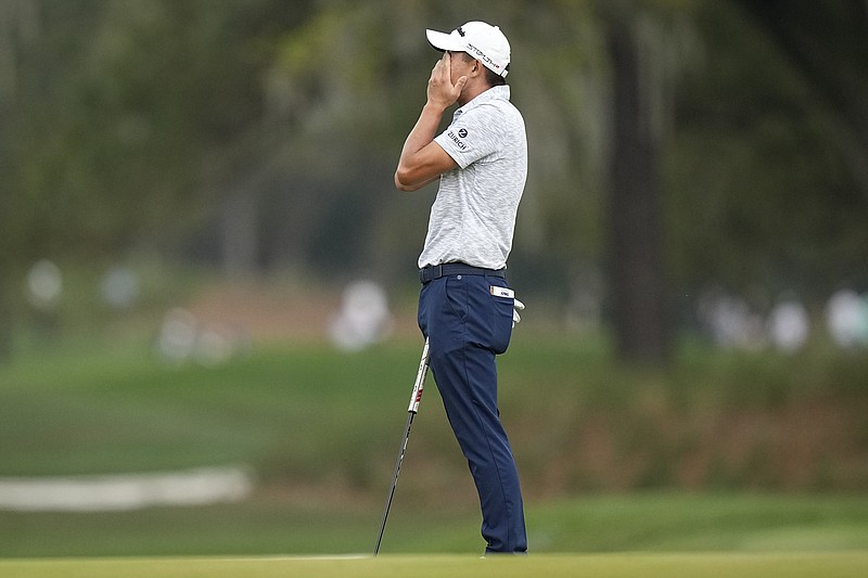 Collin Morikawa reacts after missing a putt for birdie on the 11th hole during the second round of the Players Championship golf tournament Friday, March 10, 2023, in Ponte Vedra Beach, Fla. (AP Photo/Eric Gay)