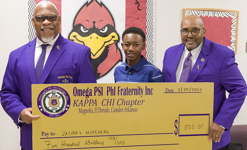 From left are Omega Psi Phi fraternity member Silberty Hyndman; first-place talent show winner Zachery Morehead; and Talent Hunt chair Terry Calahan. (Contributed)
