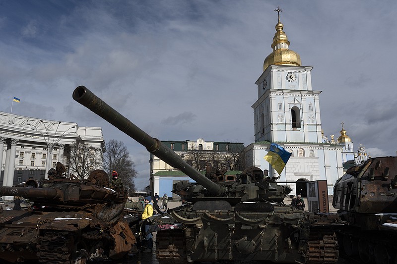 Destroyed Russian tanks and armoured vehicles are on display near the St. Michael's Cathedral in downtown Kyiv, Ukraine, Sunday, March 12, 2023. (AP Photo/Andrew Kravchenko)