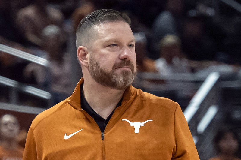 FILE - Texas head coach Chris Beard looks on during the first half an NCAA college basketball game against UTEP on Nov. 7, 2022, in Austin, Texas. Mississippi has hired Chris Beard as basketball coach five weeks after his firing from Texas following a domestic violence arrest. The Rebels announced Beard's hiring on Monday, March 13, 2023, and will introduce him Tuesday in a public event at the SBJ Pavilion. (AP Photo/Michael Thomas, File)