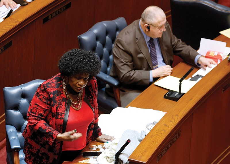 Sen. Linda Chesterfield, D-Little Rock, asks a question about House Bill 1307, which would require public entities to divest holdings with financial service providers that discriminate against energy, fossil fuel, firearms or ammunition companies, during the Senate session on Monday at the state Capitol in Little Rock.

(Arkansas Democrat-Gazette/Thomas Metthe)
