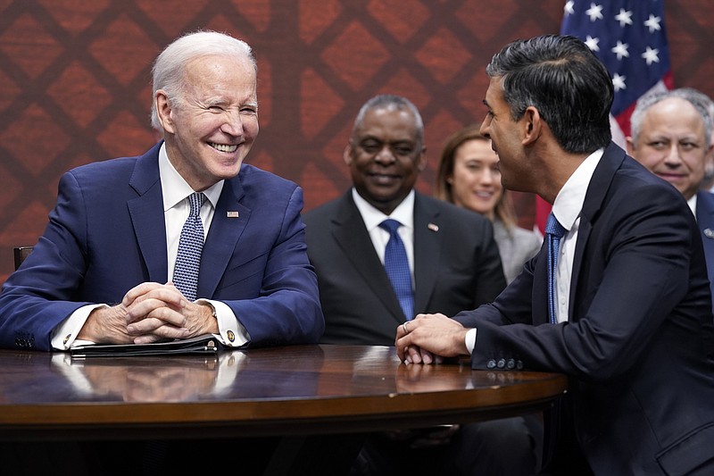 President Joe Biden participates in a meeting with British Prime Minister Rishi Sunak, right, and Australian Prime Minister Anthony Albanese at Naval Base Point Loma, Monday, March 13, 2023, in San Diego. (AP Photo/Evan Vucci)