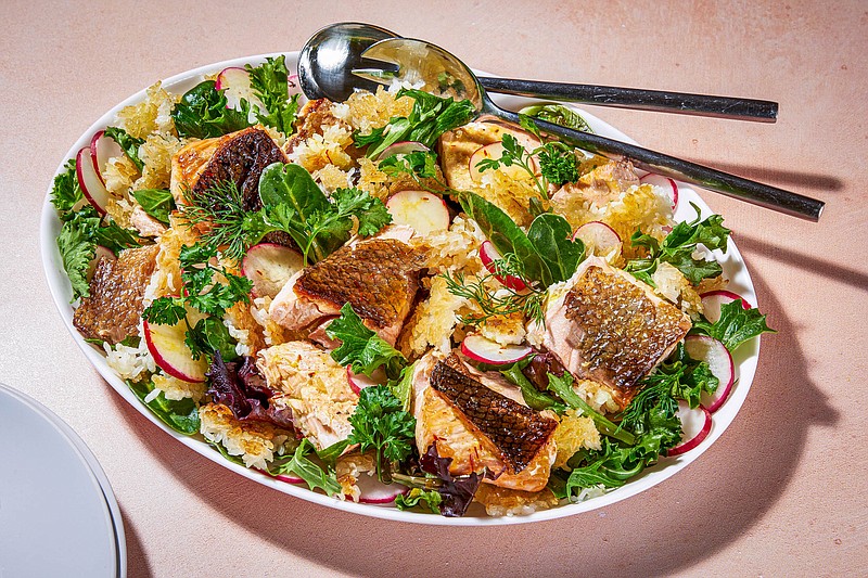 A crispy rice and fish salad with herbs is a modern way to mark Nowruz. (Photo for The Washington Post by Rey Lopez)