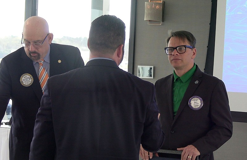 Bill Solleder, right, speaks with other members of the Hot Springs National park Rotary Club following his presentation. – Photo by Courtney Edwards of The Sentinel-Record