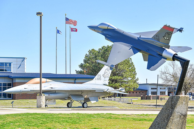 A retired General Dynamics F-16 Fighting Falcon of the Arkansas Air National Guard is seen near an F-16 statue at Ebbing Air National Guard Base in Fort Smith. The base is home to the Air National Guard’s 188th Wing. Visit nwaonline.com/photo for today's photo gallery.

(River Valley Democrat-Gazette/Hank Layton)