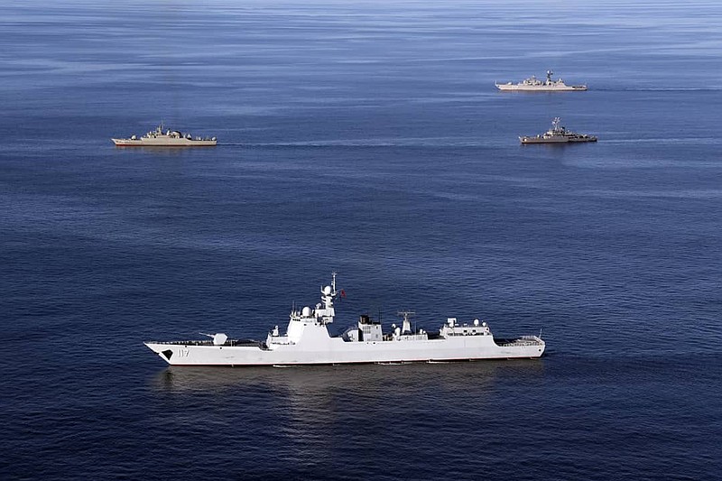 FILE - In this file photo provided by the Iranian Army, warships sail in the Sea of Oman during the second day of joint Iran, Russia and China naval war games on Dec. 28 2019.  Naval forces from China, Iran and Russia — all countries at varying degrees of odds with the United States — are staging joint drills in the Gulf of Oman this week, China’s Defense Ministry has announced. Other countries are also taking part in the “Security Bond-2023” exercises, the ministry said Tuesday, March 14, 2023, without giving details.(Iranian Army via AP, File)