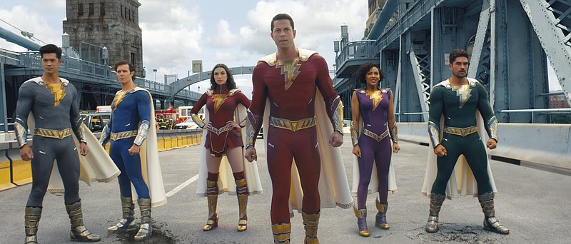This image released by Warner Bros. Pictures shows Ross Butler, from left, Adam Brody, Grace Caroline Currey, Zachary Levi, Meagan Good and D.J. Cotrona  in a scene from &quot;Shazam! Fury of the Gods.&quot; (Warner Bros. Pictures via AP)