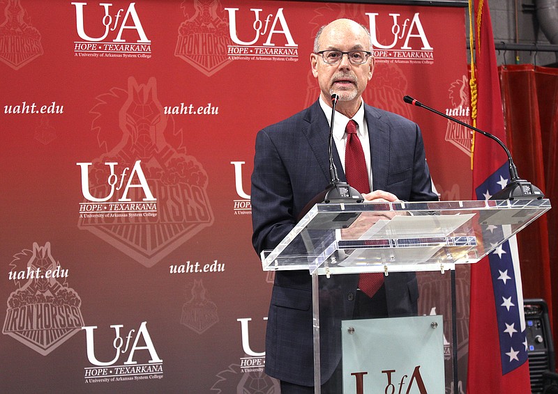 Dr. Donald R. Bobbitt, president of the University of Arkansas System, prepares to read a letter from Gov. Sarah Sanders during the grand opening ceremony of the Farmers Bank & Trust Workforce on Thursday, March 16, 2023, at the University of Arkansas Hope-Texarkana in Texarkana, Ark. Sanders was scheduled to attend but was delayed by traffic. (Staff photo by Stevon Gamble)