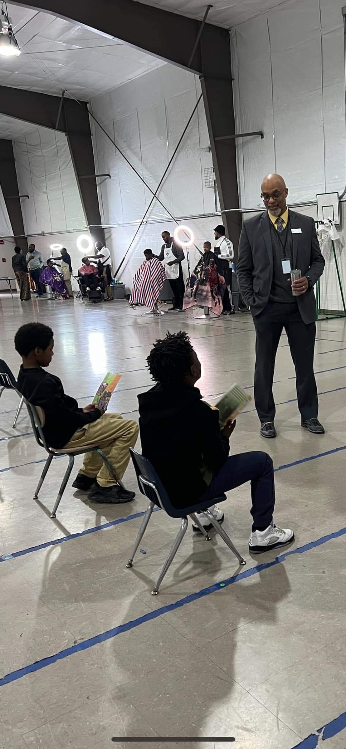 Kids get free haircuts, books at event