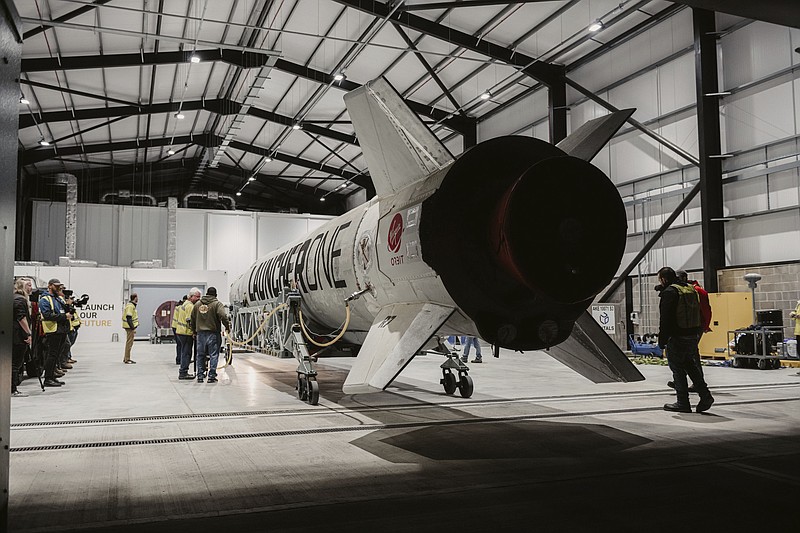The Virgin Orbit's LauncherOne rocket is seen Thursday, March 16, 2023, at Spaceport Cornwall at Cornwall Airport in Newquay, England. Virgin Orbit said Thursday it is pausing all operations amid reports that the company is furloughing almost all its staff as part of a bid to seek a funding lifeline. (UK Space Agency via AP)