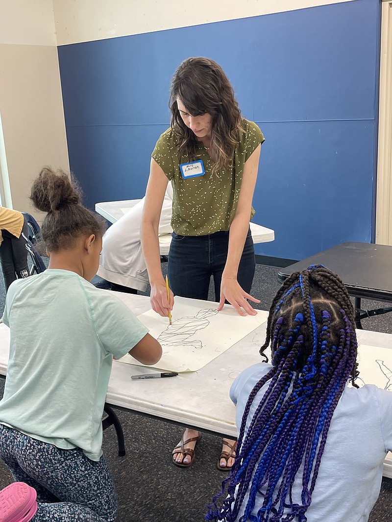 For one of the projects with Art Ventures, young artists at the Boys & Girls Club of Fayetteville posed for a photograph in a way that represented themselves or an activity that they enjoy. After drawing from their projected images, they filled their silhouettes with overlapping lines to mimic the 3-D hanging sculptures by Ruth Asawa. (Courtesy Photo)