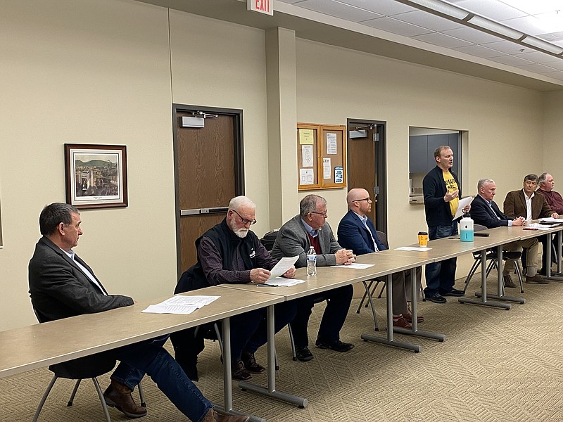 Anakin Bush/Fulton Sun
Joe Burns stands and speaks to the gathered crowd at Wednesday's meeting about solar energy and Grain Belt Express. Left to right:  Mike Haffner, Jim Schulte, Kent Haden, Travis Fitzwater, Joe Burns, Steven Jeffery, Roger Fischer and Randy Kleindienst.