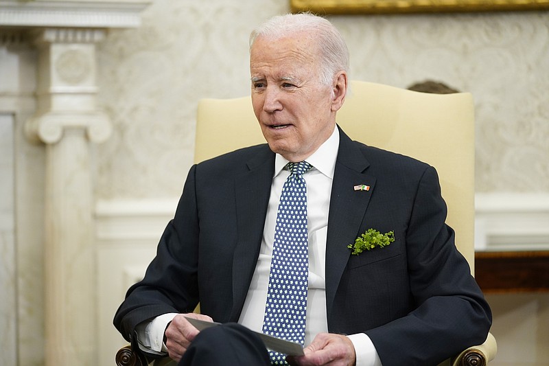 President Joe Biden speaks as he meets with Ireland's Taoiseach Leo Varadkar in the Oval Office of the White House, Friday, March 17, 2023, in Washington. (AP Photo/Evan Vucci)