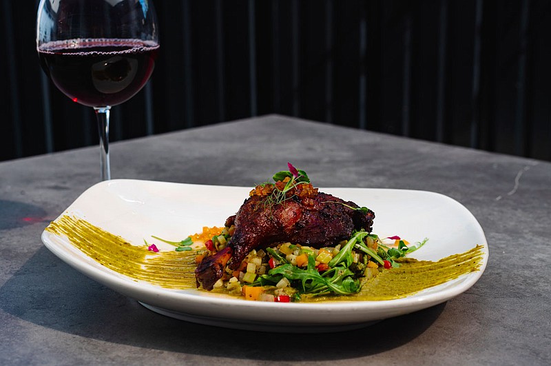 Duck confit at Wellington's. The restaurant with an enclosed cigar lounge opened earlier this month at 5102 W. Pauline Whitaker Pkwy.

(Courtesy photo/Wellington's)