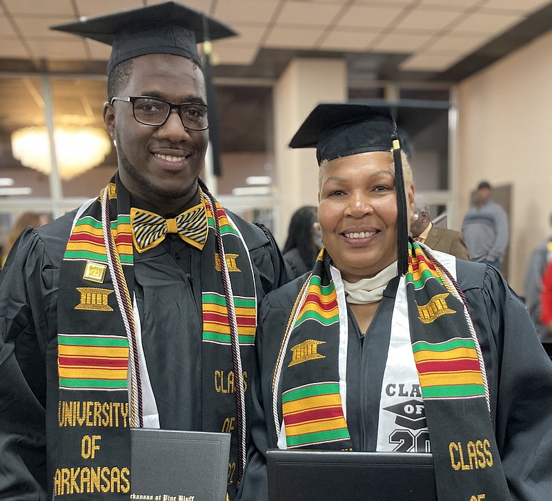 Marion Franklin Smith III (left) and Stephanie Smith display their degrees at the University of Arkansas at Pine Bluff’s commencement ceremony in December 2022. (Special to The Commercial/University of Arkansas at Pine Bluff)