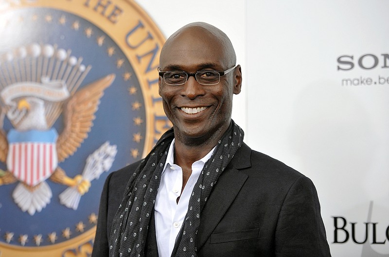 FILE - Actor Lance Reddick appears at the &quot;White House Down&quot; premiere in New York on June 25, 2013. Reddick, a character actor who specialized in intense, icy and possibly sinister authority figures on TV and film, including &#x201c;The Wire,&#x201d; @Fringe&#x201d; and the &#x201c;John Wick&#x201d; franchise, died suddenly on Friday, March 17, 2023. He was 60. (Photo by Evan Agostini/Invision/AP, File)