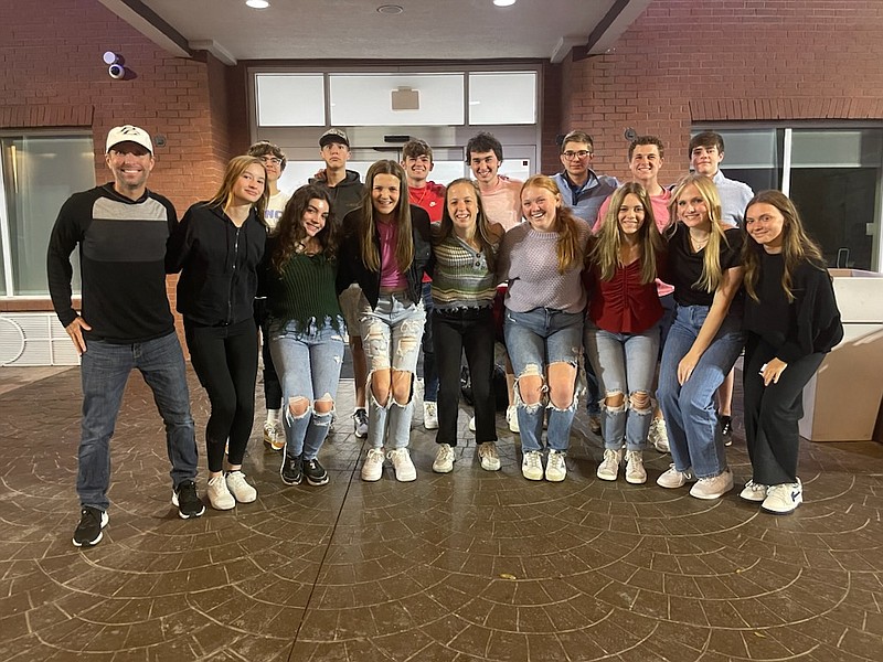 Pleasant Grove's tennis team pose for a photo on Friday, March 17, 2023, after the Rockwall St. Patrick's Day Tournament in Rockwall, Texas (Submitted photo)